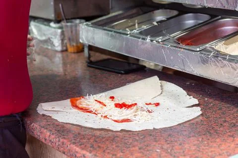 Hands of a professional chef who makes Shawarma Fotos Stock