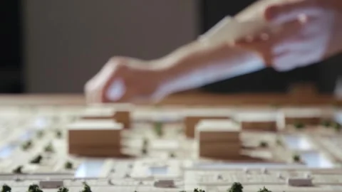 Hands of Professional Man Constructing Architecture Model of Urban Town Building 스톡 동영상 282499294