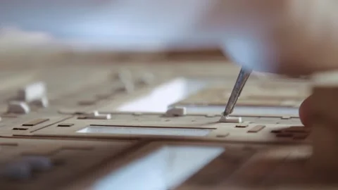 Hands of Professional Man Constructing Architecture Model of Urban City Building Stock Footage 321116369