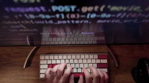 Hands of Professional Programmer is typing code. Top down wide shot Video stock 276819657
