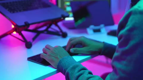 Hands of a Programmer Typing on a Keyboard in a High-Tech Workspace for Cod.. Stock-Footage 336678380