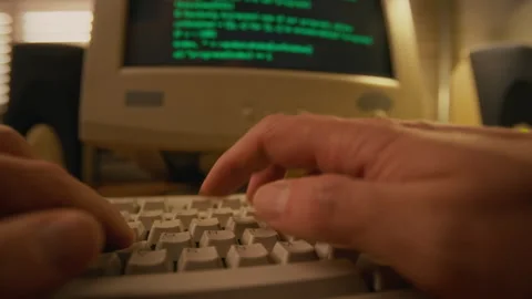 Hands of Programmer Writing Code on Vintage 1980s Computer Stock Footage 327236077