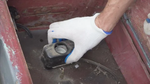 Hands in protective gloves unscrewing old chuck socket. Stock-Footage 332971631