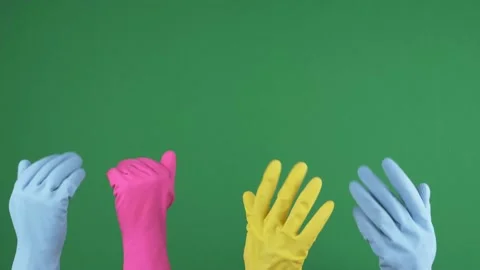 Hands with protective rubber gloves rising up and waving to invite on chroma key 스톡 동영상 156079337