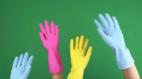 Hands with protective rubber gloves rising up and starts waving, making greeting Stock-Footage 157937825