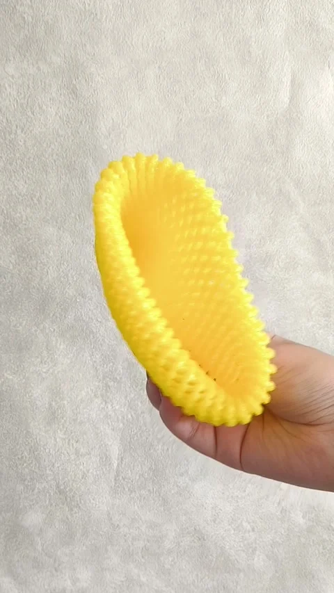 Hands pull foam mesh for fruit packaging. Packaging for transportation, delivery Video stock 332409810
