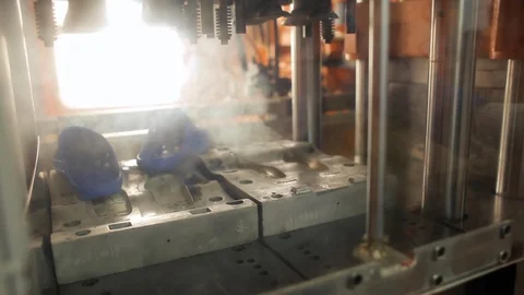 Hands Pull Out The Rubber Soles From The Machine For Molding Shoe Vidéo 106858853