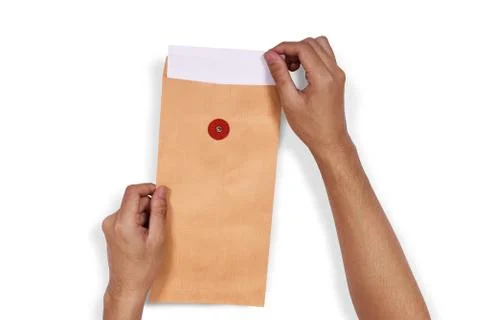 Hands pull the white paper from envelope Stock Photos