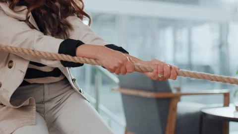 Hands, pulling and rope with business people in office for collaboration, effort Stock Footage 312495500