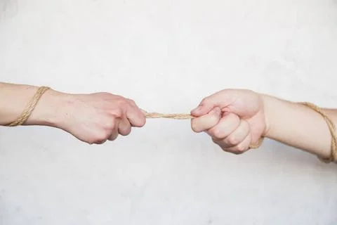 Hands pulling rope hands pulling rope Copyright: xZoonar.com/OleksandrxLat... 스톡 사진