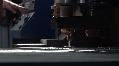 Hands push buttons and make plasma cutter emit flame closeup Stock Footage 118579801