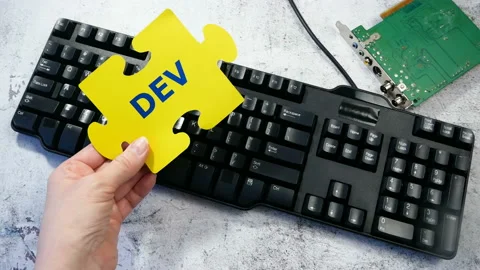 Hands put on board words Dev and Ops. DevOps Concept for software engineering 스톡 동영상 154628230