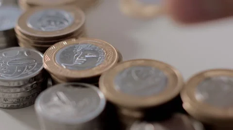 Hands put a Brazilian Coins at table 스톡 동영상 58508969