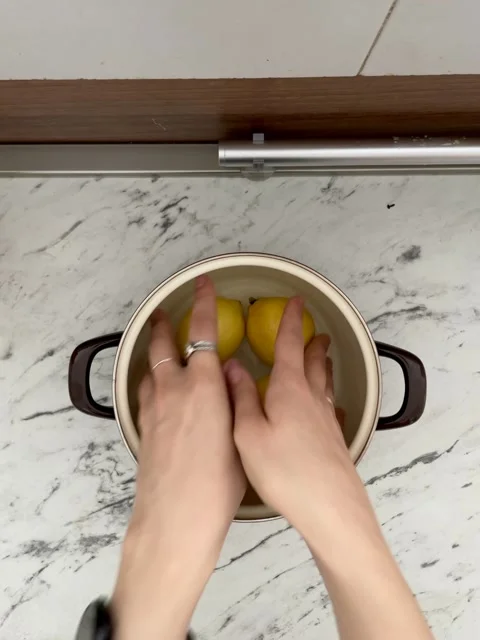 Hands put four lemons in the pan flatlay Stock Footage 249041695