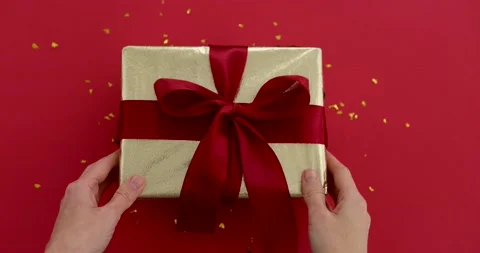 Hands put the gift box on the table Stock Footage 181899015