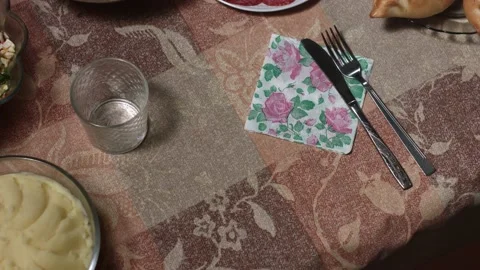 Hands put a plate on the table Stock Footage 142930154