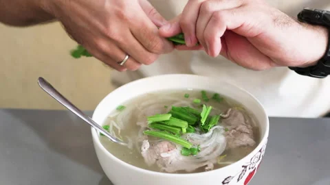 Hands put into the soup greenery. Stock Footage 266873090