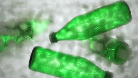 Hands put two green bottles of water or soda in a container with ice. Stock Footage 149193046
