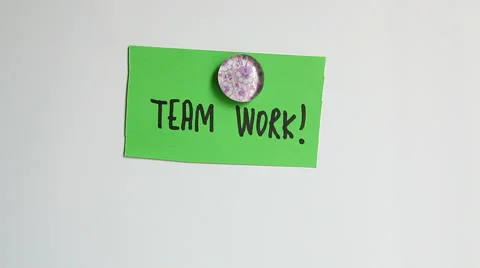 Hands put words about Team Work on the white wall 動画素材 65339443