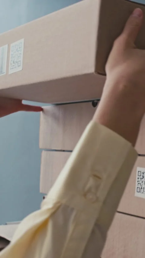 Hands Putting Box on Top while Working with Parcels at Postal Office Video stock 251342184