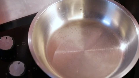 Hands putting foie gras with fig on hot pan. Stock Footage 122095421