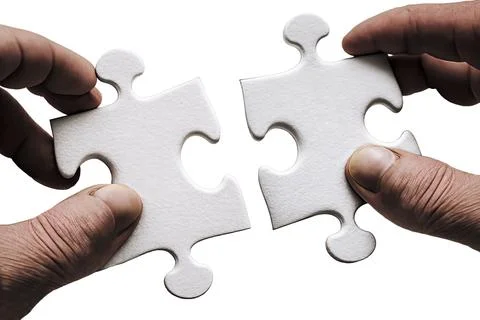 Hands putting puzzle pieces together Stock Illustration