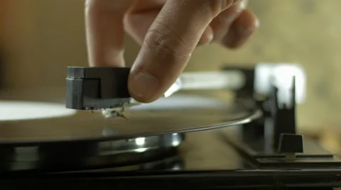 Hands putting a record on a turntable Stock Footage 67110434