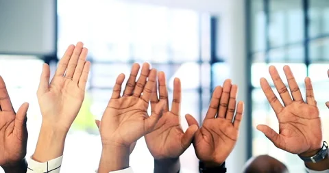 Hands, question and vote with a business team standing raised hand together in Stock Footage 221990201