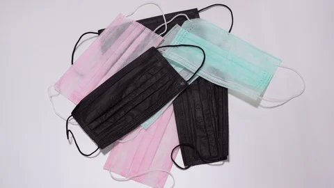 Hands quickly take protective masks. Concept of panic people, deficit of masks Stock Footage 127789342