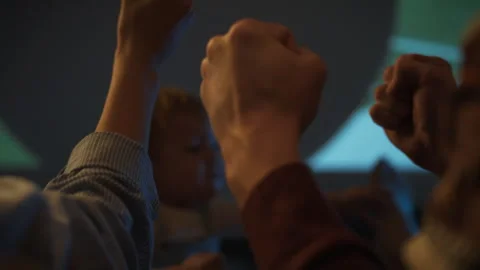 Hands raised in celebration during an event filled with excitement and energ Stock Footage 301404311
