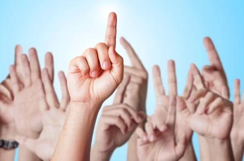 Hands Raised Together Stock Photos