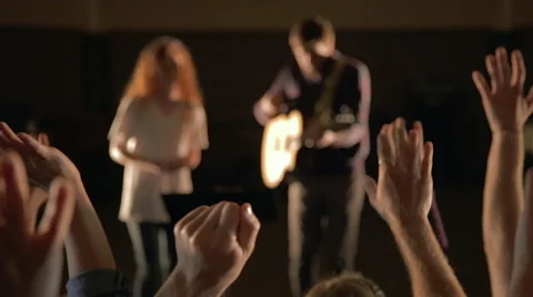 HANDS RAISED WORSHIPING Stock Footage 65716007