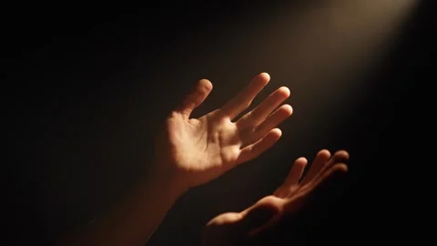 Hands Reaching Toward Divine Light in Desperation Stock Footage 312477487