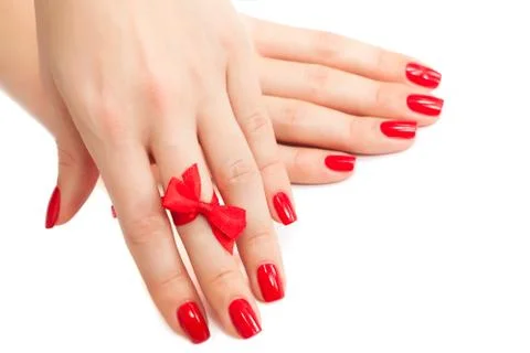 Hands with red manicure Stock Photos