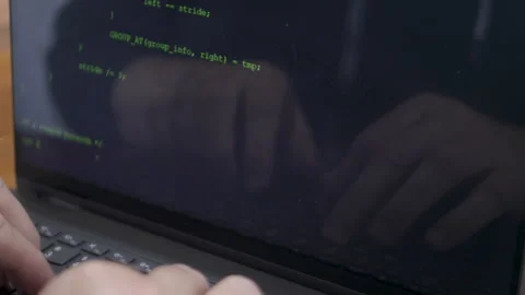 Hands reflected in computer screen, typing coding language. Stock Footage 272193235