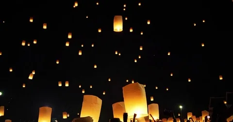 Hands Releasing Floating Sky Lanterns Stock Footage 71358197