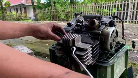 Hands Repairing Motorcycle Engine Close Up Stock Footage 328017782