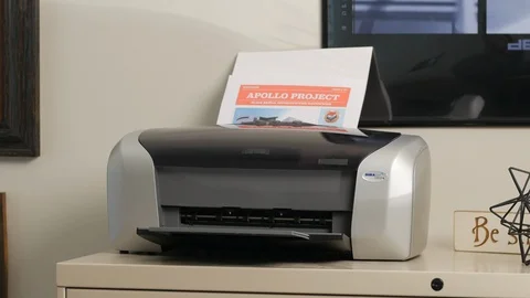 Hands retrieving print from printer Stock-Footage 118725027
