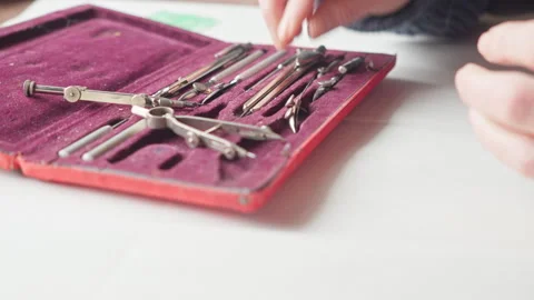 Hands Return Precision Drafting Tools to Case with fitted nesting interior Vídeo Stock 333461678