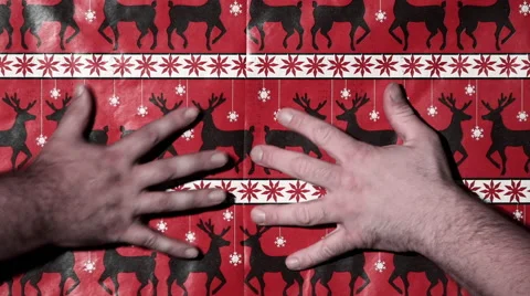 Hands Rip Open Wrapping Paper Transition Stock Footage 54300209