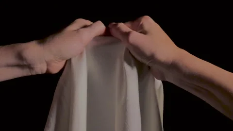 Hands rip off a white cloth. Stock Footage 211048185