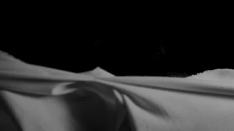 Hands rip off a white cloth. 스톡 동영상 211048365