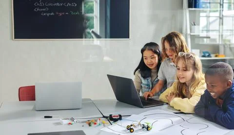 Hands-on robot programming project for kids in a coding classroom Photos