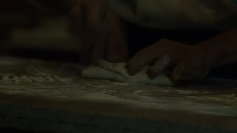 Hands rolling and folding pizza dough  in restaurant RED 4K Stock Footage 113845786