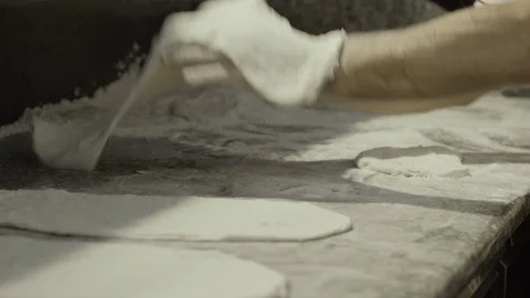 Hands rolling the dough Stock Footage 86170116
