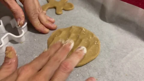 Hands rolling out Christmas cookie dough Stock Footage 340764231