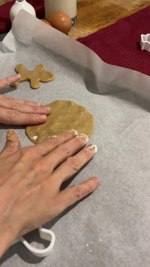 Hands rolling out Christmas cookie dough Stock Footage 340764232