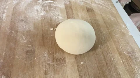 Hands rolling out dough to make dumplings in Xi&amp;#039;an, China. Stock Footage 330923250