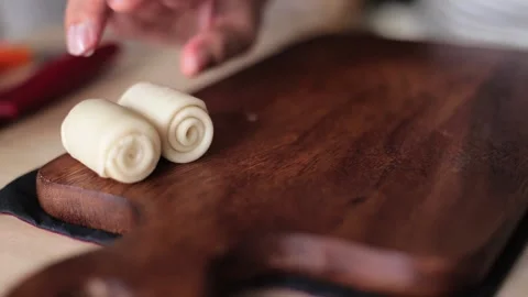 Hands rolls it with a rolling pin The process of cooking baking. Stock Footage 135887908
