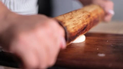 Hands rolls it with a rolling pin The process of cooking baking. Stock Footage 135887989